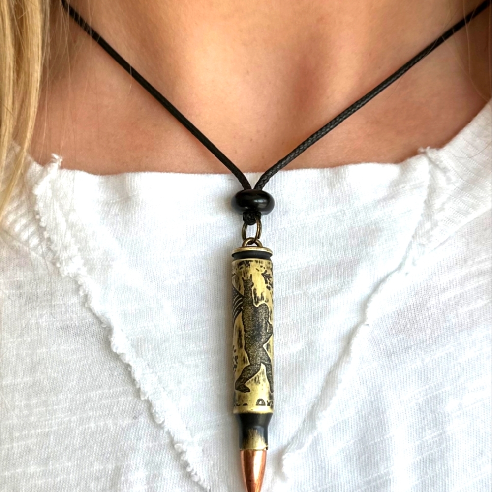 Engraved .223 Bullet with tip. Bigfoot holding the American Flag Necklace